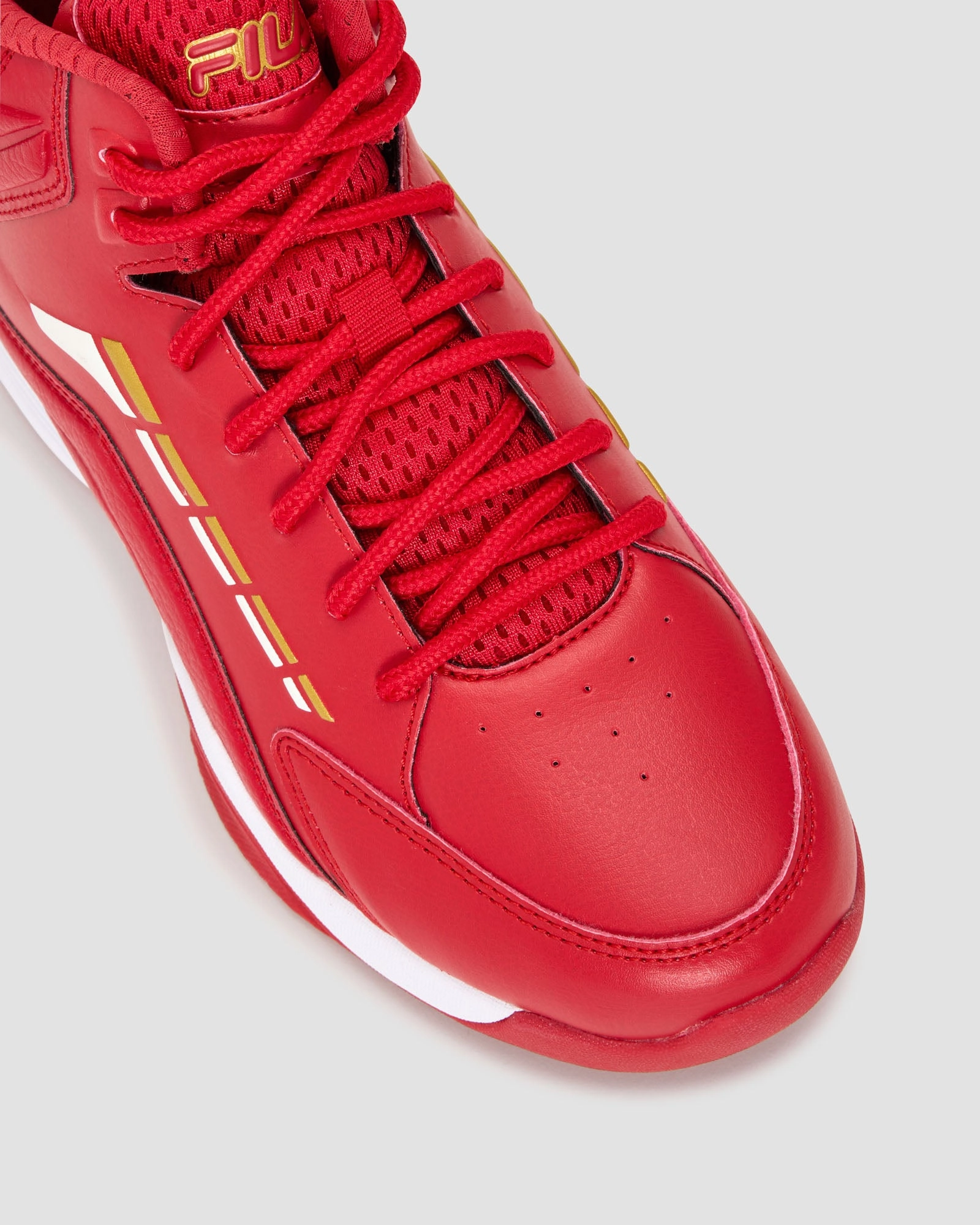 Kid's Spitfire Evo 2 running in stadium dirt path