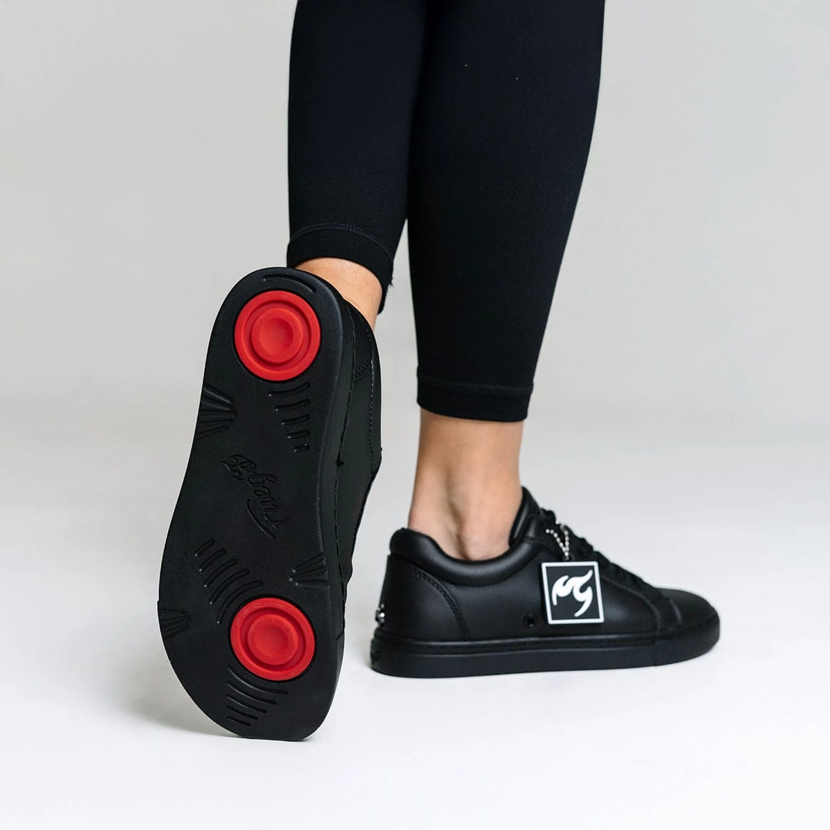 All-black | Low-top (Collective) Enhanced cushioning offers reliable shock absorption